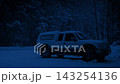 Snow Falls On Truck In The Woods 143254136