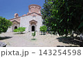 Saint Mary Church in Apollonia, ancient Roman city near the Vlore town in Albania, Europe. Ancient Byzantine Church Exterior With Lush Garden And Trees In Bright Sunny Daylight 143254598