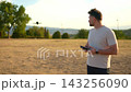 Exploring the skies with a drone in a sunny park setting 143256090
