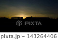 Silhouette of urban buildings at dusk 143264406