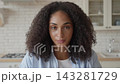 Serious Woman Looking At Camera In Home Kitchen Interior Portrait 143281729
