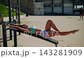 Contemporary dancer captured in precise core extension pose 143281909