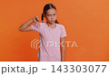 Upset preteen child girl showing thumbs down, dislike bad work, disapproval, dissatisfied feedback 143303077