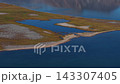 Aerial drone footage above stunning tundra lagoons of Abolesheva Bay Chukotka 143307405