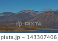 Aerial video of stunning reflective fjord below ridge in Abolesheva Bay Chukotka 143307406