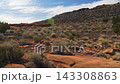 Scenic view of desert valley landscape under blue sky Scenic view of desert valley landscape under blue sky 143308863