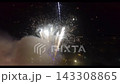 Red fireworks exploding in the night sky celebration concept Red fireworks exploding in the night sky celebration concept 143308865