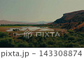 Aerial view of mountain valley landscape with lake and scenic nature view Aerial view of mountain valley landscape with lake and scenic nature view 143308874