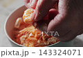 Peeling Boiled Shrimp Shell by Hand Culinary Preparation 143324071