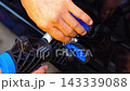 Removing dents on the car. PDR technology. Car body repair without painting. 143339088