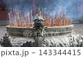 Traditional Incense Burner with Burning Sticks in Chengdu Temple. 143344415