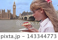 Girl Happily Biting Jam Pancake 143344773