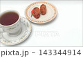 Hot black coffee cup with fried croquettes on white background 143344914
