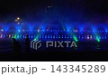 Colorful dancing fountain show at night in city Colorful dancing fountain show at night in city 143345289