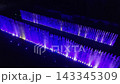 Colorful illuminated dancing fountain at night Colorful illuminated dancing fountain at night 143345309