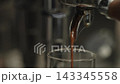 Closeup shot of pulling an espresso shot from coffee machine 143345558