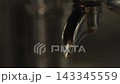 Closeup shot of pulling an espresso shot from coffee machine 143345559