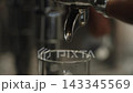 Closeup shot of pulling an espresso shot from coffee machine 143345569