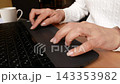 female hands working on laptop keyboard. 143353982
