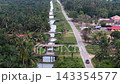 Aerial view shows a canal running through tropical at Parit Jawa 143354577