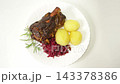 Roasted Pork Knuckle with Potatoes and Red Cabbage Top View 143378386
