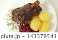 Roasted Pork Knuckle with Potatoes and Red Cabbage Top View 143378541