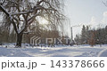 Winter sunny day in ukrainian city park 143378666