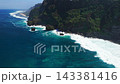 Scenic landscape with cliff coastline, sandy beach with blue ocean and waves. Aerial view. High quality 4k footage 143381416