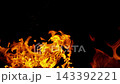 Super Slow Motion Shot of Real Flames and Flying Sparks Isolated on Black at 1000 fps. 143392221