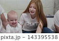 Cheerful happy family on the bed. 143395538