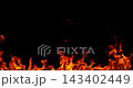 Fire and glowing sparks captured in extreme super slow motion at 1000fps on a cinematic high-speed camera against a pure black background, creating a dramatic VFX overlay. 143402449