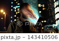 Young Man Absorbed by Glowing Smartphone Display in Night City. Alone People Face Warp Visualizing Social Media Addiction, Digital Overload, Dopamine Trap, Mental Fatigue and Loss of Human Identity 4k 143410506