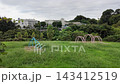 A view of Shinba Hills Park, with its playground equipment and expansive lawns - Yokohama City, Kanagawa Prefecture, Japan 143412519