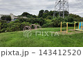 A view of Shinba Hills Park, with its playground equipment and expansive lawns - Yokohama City, Kanagawa Prefecture, Japan 143412520