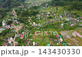 Aerial view town of Sagada, located in the mountainous province of Philippines. City in the valley among the mountains covered with forest. Sagada-Cordillera region-Luzon island. 143430330