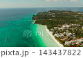 Aerial view of beautiful bay in tropical Island with white sand beach Boracay, Philippines. White beach with tourists and hotels. Tropical white beach with sailing boat. 143437822