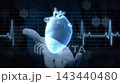 Hand holding a holographic heart with medical data HD 143440480