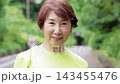Senior woman smiling in sportswear 143455476