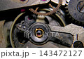 Macro shot of vintage mechanical watch movement with ruby jewel bearing and oscillating balance wheel 143472127