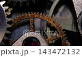 Macro shot of rusty vintage mechanical watch gears and clockwork mechanism turning 143472132