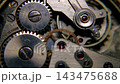 Top view macro shot of Swiss made vintage mechanical watch movement with rotating gears and ruby jewel bearings 143475688