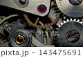 Extreme macro shot of vintage mechanical watch movement showing multiple ruby jewel bearings and rotating gears 143475691