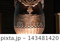 Intricate Carved Patterns on Traditional Uzbek Wooden Columns at Night. 143481420