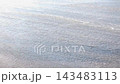 Cars drive on wet asphalt when it rains 143483113