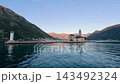 Scenic water view of Our Lady of the Rocks island near Perast Montenegro 143492324