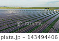 Vast Photovoltaic Rows Reaching Rural Horizon Vast Photovoltaic Rows Reaching Rural Horizon 143494406