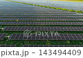 Utility Solar Rows Stretching Toward Horizon Utility Solar Rows Stretching Toward Horizon 143494409
