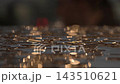 Sunset sunlight shines on transparent raindrops on a wooden surface, blurry background 143510621