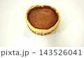 Delicious baked burnt basque cheesecake on white background. 143526041