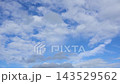 Textured clouds are flying across the blue sky. Timelapse. 143529562
